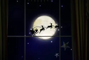 The White House Library is decorated to honor the tradition and magic of bedtime stories, including an image of Santa Claus flying past the moon, during a media preview of the 2023 holiday decorations November 27, 2023 in Washington, DC. The theme for this year's White House decorations is “Magic, Wonder and Joy,” and is designed to capture the “delight and imagination of childhood.” The White House expects to welcome approximately 100,000 visitors during the holiday season. (Photo by Kevin Dietsch/Getty Images)