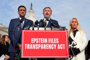 Rep. Thomas Massie (R-KY) (C) speaks alongside U.S. Rep. Ro Khanna (D-CA) (L) and Rep. Marjorie Taylor Greene (R-GA) during a news conference on the Epstein Files Transparency Act outside the U.S. Capitol on November 18, 2025 in Washington, DC. (Photo by Heather Diehl/Getty Images)