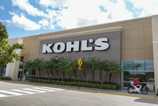 MIAMI, FLORIDA - MARCH 12: A Kohl's department store sign hangs outside the building on March 12, 2024 in Miami, Florida. Shares of Kohl's fell as it posted a drop in same-store sales in the fourth quarter. The company's annual sales and profit are projected to be below market expectations, joining Macy's and Nordstrom to warn of a challenging year for U.S. department stores. (Photo by Joe Raedle/Getty Images)