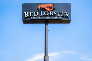 AUSTIN, TEXAS - MAY 20: The Red Lobster logo is displayed near a Red Lobster restaurant on May 20, 2024 in Austin, Texas. Red Lobster will remain open for Christmas. (Photo by Brandon Bell/Getty Images)
