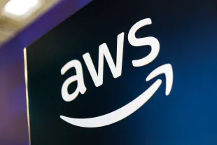 The brand logo of AWS Amazon Web Services (brand, logo, symbol, emblem, company logo) can be seen at the company's stand at the IAA Mobility (International Motor Show) in a hall of Messe München (Bavaria, Germany) on September 12, 2025. AWS (Amazon Web Services) is Amazon's global, comprehensive cloud computing platform that provides a variety of IT services such as computing power, storage, databases, network functions and AI offerings. (symbol image, symbol photo, illustration, symbolic photo, illustrative photo, theme image, general image, theme photo) Photo: Matthias Balk/dpa (Photo by Matthias Balk/picture alliance via Getty Images)