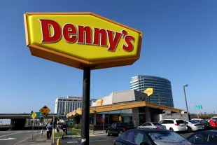 A sign is posted in front of a Denny's restaurant on February 13, 2023 in Emeryville, California. Denny's restaurant will report fourth quarter earnings today after the closing bell. (Photo by Justin Sullivan/Getty Images)