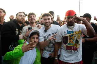 LONDON, ENGLAND - JULY 11: (EDITORIAL USE ONLY) FaZe Rug (2L) and Adin Ross (C) attend Wireless Festival at Finsbury Park on July 11, 2025 in London, England. (Photo by Joseph Okpako/WireImage)