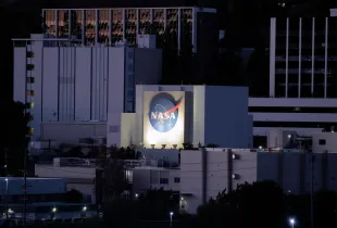 LA CAÑADA FLINTRIDGE, CALIFORNIA - OCTOBER 15: The NASA logo is displayed at NASA’s Jet Propulsion Laboratory on October 15, 2025 in La Cañada Flintridge, California. Around 550 people, or over ten percent of the famed lab’s workforce, are being laid off as part of an ongoing reorganization following two rounds of large layoffs last year. Layoffs at the laboratory, which is funded by NASA and managed by CalTech, are not related to the federal government shutdown. (Photo by Mario Tama/Getty Images)
