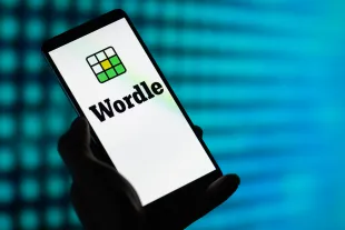 The Wordle logo is being displayed on a smartphone in this photo illustration in Brussels, Belgium, on June 1, 2024. (Photo by Jonathan Raa/NurPhoto via Getty Images)