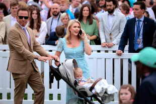WASHINGTON, DC - APRIL 21: White House Press Secretary Karoline Leavitt and her husband Nicholas Riccio arrive to the White House Easter Egg Roll on the South Lawn of the White House on April 21, 2025 in Washington, DC. The White House said they are expecting thousands of children and adults to participate in the annual tradition of rolling colored eggs down the White House lawn, a tradition started by President Rutherford B. Hayes in 1878. (Photo by Chip Somodevilla/Getty Images)