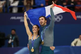 French ice dancers Laurence Fournier Beaudry and Guillaume Cizeron's gold medal win at the 2026 Winter Olympics prompts biased judgment allegations. (Image by Matthew Stockman/Getty Images)