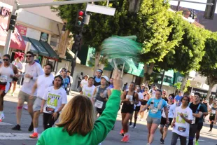 HOLLYWOOD, CALIFORNIA - MARCH 08: Individuals participate in the Los Angeles Marathon near an Oscars Red Carpet Experience held as a collaboration between The Academy Of Motion Picture Arts and Sciences and the Los Angeles Marathon on March 08, 2026 in Hollywood, California - Source: Getty
