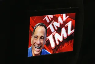 LAS VEGAS, NV - AUGUST 28:  A TMZ logo and photo of TMZ Founder and Executive Producer Harvey Levin is displayed during the launch party for IGT's TMZ Video Slots at the Hard Rock Hotel & Casino on August 28, 2016 in Las Vegas, Nevada - Source : Getty