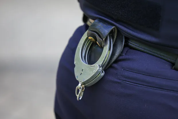 08 September 2025, Dinslaken: Handcuffs can be seen on the belt of a police officer. Photo: Christoph Reichwein/dpa (Photo by Christoph Reichwein/picture alliance via Getty Images)