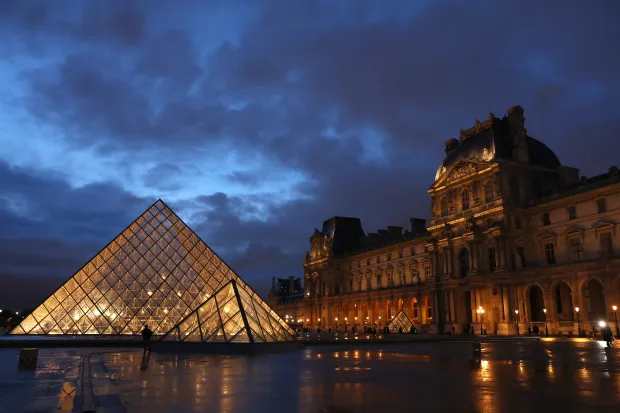PARIS, FRANCE - MARCH 05: The Louvre museum is pictured at dusk on March 05, 2024 in Paris, France. (Photo by Pascal Le Segretain/Getty Images)