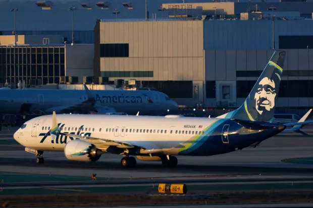 LOS ANGELES, CALIFORNIA - SEPTEMBER 1: An Alaska Airlines Boeing 737 MAX 9 taxis at Los Angeles International Airport after arriving from Seattle on September 1, 2024 in Los Angeles, California.  (Photo by Kevin Carter/Getty Images)
