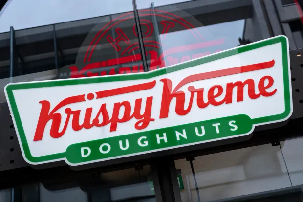 Sign for the brand Krispy Kreme outside their new store on Oxford Street on 9th June 2024 in London, United Kingdom. Krispy Kreme, previously known as Krispy Kreme Doughnuts, Inc is an American multinational doughnut company and coffeehouse chain. (photo by Mike Kemp/In Pictures via Getty Images)