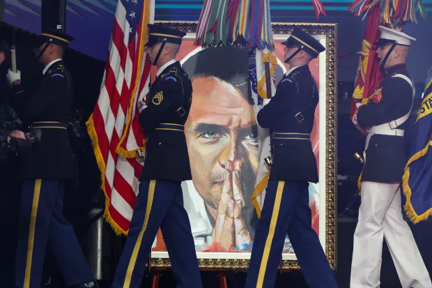 GLENDALE, ARIZONA - SEPTEMBER 21: Color guard perform during the memorial service for political activist Charlie Kirk at State Farm Stadium on September 21, 2025 in Glendale, Arizona. Kirk, the CEO and co-founder of Turning Point USA, was shot and killed on September 10th while speaking at an event during his "American Comeback Tour" at Utah Valley University. (Photo by Joe Raedle/Getty Images)
