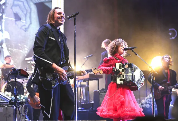 Win Butler and Régine Chassagne of Arcade Fire perform on stage during the 20th Anniversary of their debut album "Funeral" at the O2 Academy Brixton on July 04, 2024 in London, England.  (Photo by Gus Stewart/Redferns)