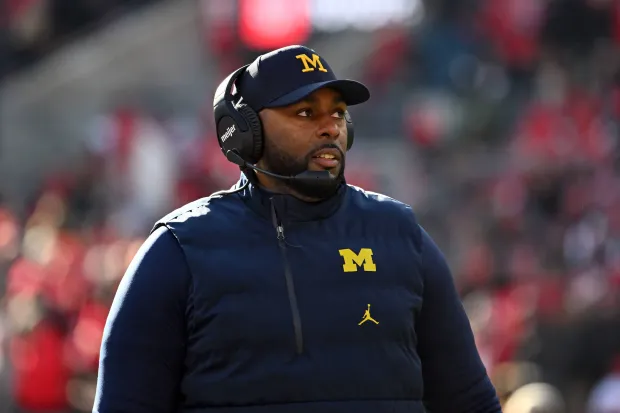 COLUMBUS, OHIO - NOVEMBER 30: Head coach Sherrone Moore of the Michigan Wolverines stands during a timeout in the third quarter of a game against the Ohio State Buckeyes at Ohio Stadium on November 30, 2024 in Columbus, Ohio. (Photo by Ben Jackson/Getty Images)