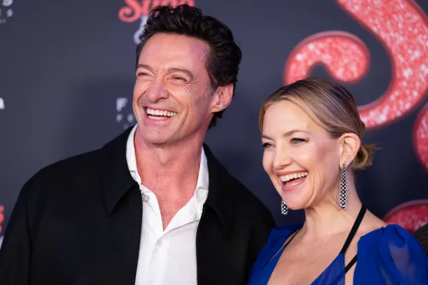Hugh Jackman and Kate Hudson attend the "Song Sung Blue" premiere at Zoo Palast on November 19, 2025 in Berlin, Germany. (Photo by Andreas Rentz/Getty Images)
