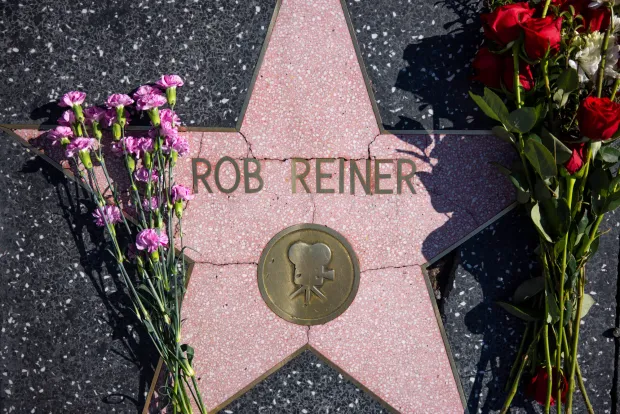 Los Angeles, CA - December 15, 2025: Flowers are seen placed ontop of Rob Reiner's Hollywood Walk of Fame Star on Monday, Dec. 15, 2025 in Los Angeles, CA. Nick Reiner was arrested on suspicion of homicide of his parents Rob and Michele Singer Reiner after they were found dead at their Brentwood home on Sunday. (Kayla Bartkowski / Los Angeles Times via Getty Images)