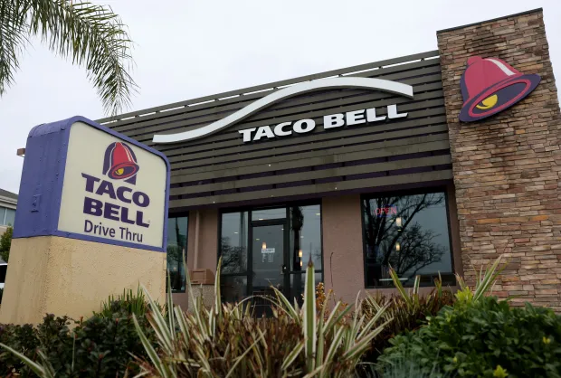 A view of a Taco Bell restaurant on February 06, 2025 in Dublin, California. Taco Bell parent company Yum Brands reported fourth-quarter earnings that beat analyst expectations with net sales surging 16% to $2.36 billion. (Photo by Justin Sullivan/Getty Images)