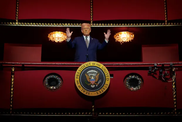 President Donald Trump looks down from the Presidential Box in the Opera House at the John F. Kennedy Center for the Performing Arts as he participates in a guided tour and leads a board meeting on March 17, 2025 in Washington, DC. (Photo by Chip Somodevilla/Getty Images)