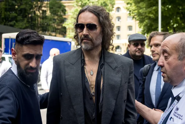 Russell Brand leaves Southwark Crown Court after pleading not guilty on May 30, 2025 in London, England. (Photo by Jack Taylor/Getty Images)