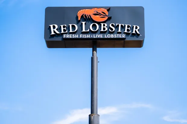 AUSTIN, TEXAS - MAY 20: The Red Lobster logo is displayed near a Red Lobster restaurant on May 20, 2024 in Austin, Texas. Red Lobster will remain open for Christmas. (Photo by Brandon Bell/Getty Images)