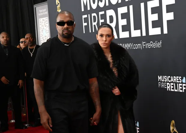 LOS ANGELES, CALIFORNIA - FEBRUARY 02: (FOR EDITORIAL USE ONLY) (L-R) Kanye West and Bianca Censori attend the 67th GRAMMY Awards on February 02, 2025 in Los Angeles, California. (Photo by Jon Kopaloff/WireImage)