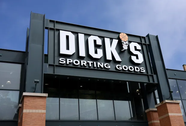 A sign is posted in front of a Dick's Sporting Goods store on September 04, 2024 in Daly City, California. (Photo by Justin Sullivan/Getty Images)